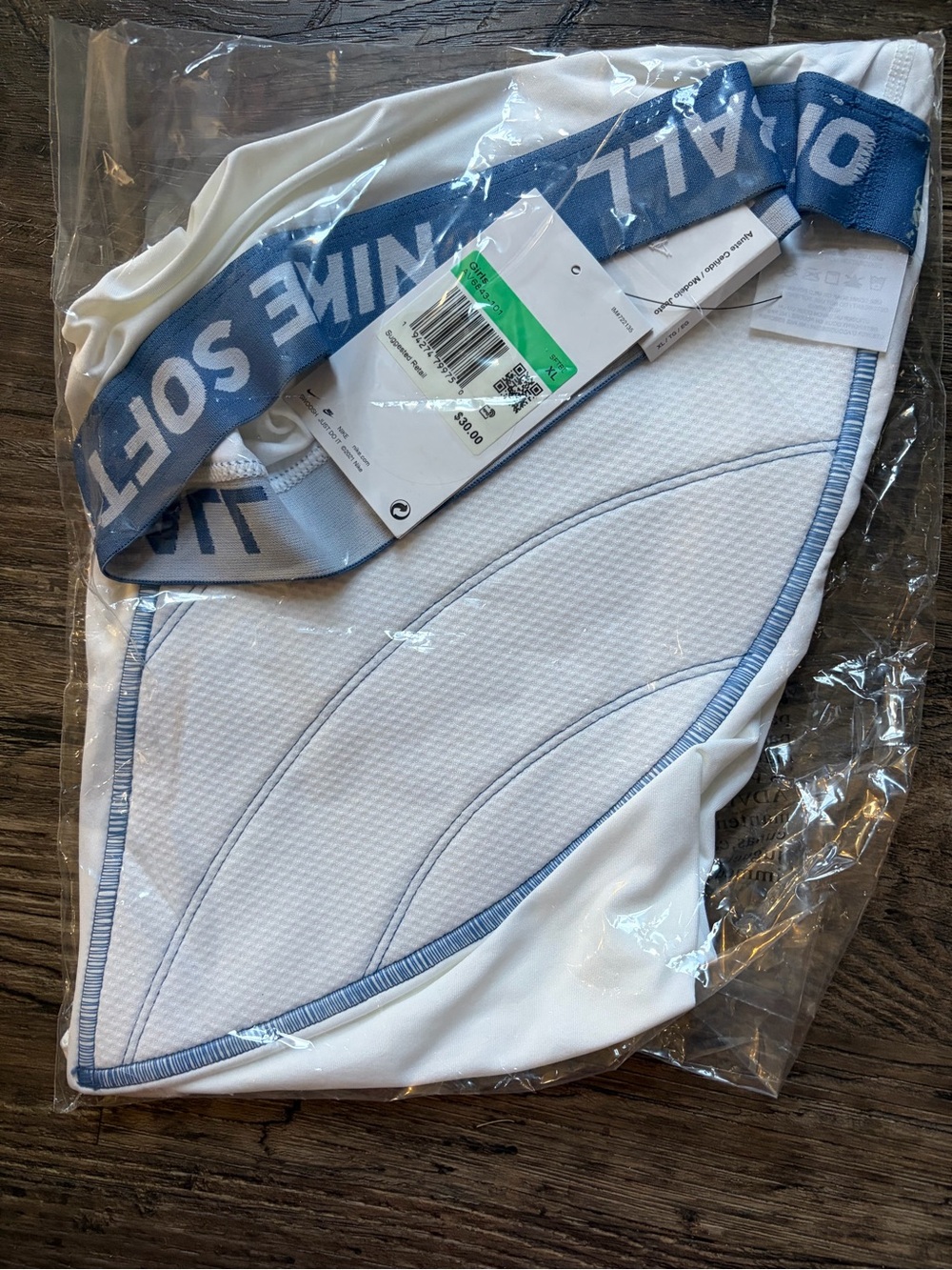 Nike Women's White Athletic Shorts with Light Blue Trim
